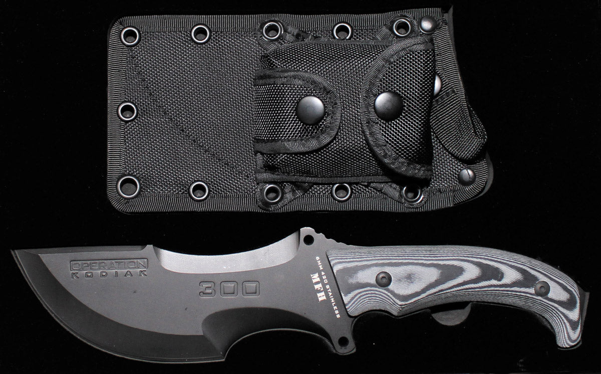 Cutit fix Operation Kodiak MFH cu teaca si amnar
